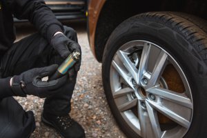 Mobile Tyres 2 U mechanic inspecting wheel changing tool